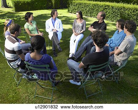 Stock Image - "People in rehab, outdoors". Fotosearch
