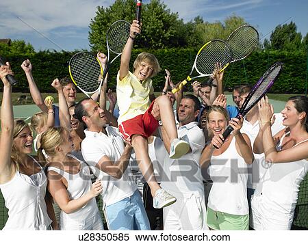 Stock Photography - "People raising the winner, tennis court". Fotosearch