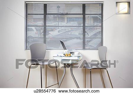 Stock Photograph - Picture of laptop on cafe table. Fotosearch