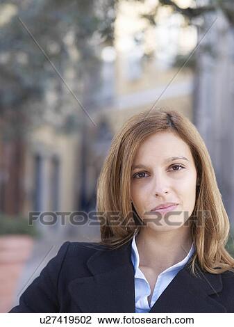 Stock Image - Portrait of a young business woman. Fotosearch