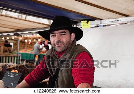 Stock Photograph - Portrait of Corsican vendor. Fotosearch
