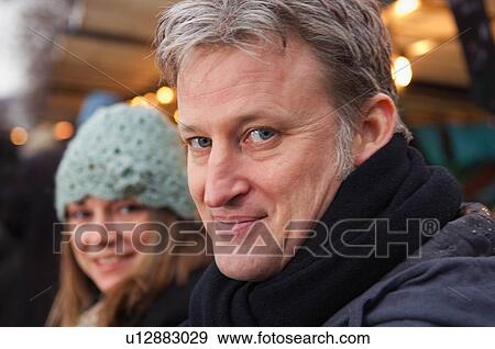 Stock Photo - Portrait of man at outdoor market. Fotosearch
