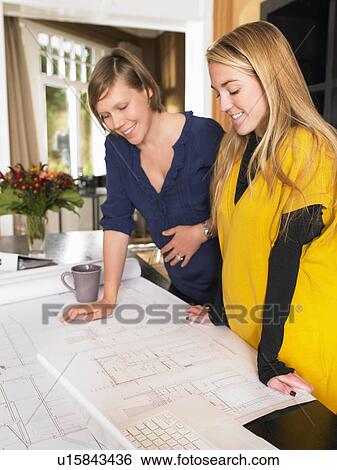 Stock Photograph - Pregnant women at work. Fotosearch