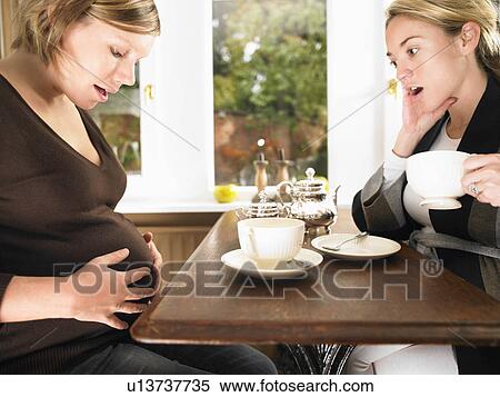Pregnant women having tea View Large Photo Image Stock Photography - Pregnant women having tea. Fotosearch