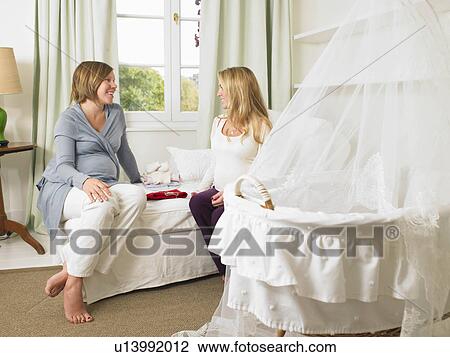 Pregnant women in nursery View Large Photo Image Stock Image - Pregnant women in nursery. Fotosearch
