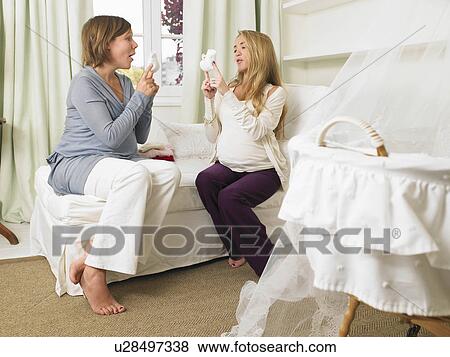 Pregnant women in nursery View Large Photo Image Stock Photo - Pregnant women in nursery. Fotosearch