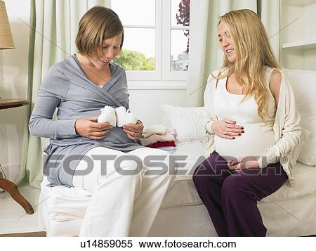 Stock Photography - Pregnant women in nursery. Fotosearch
