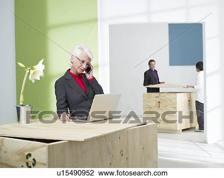Senior business women with mobile phone View Large Photo Image Stock Image - Senior business women with mobile phone. Fotosearch