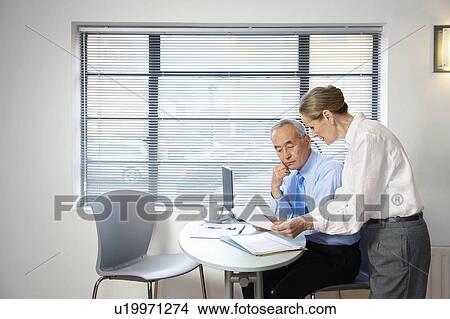Picture - Senior co-workers having casual meeting. Fotosearch