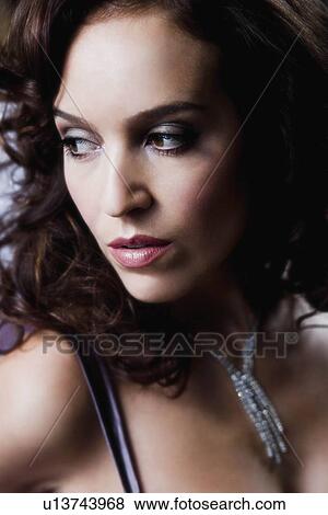 Sexy young woman looking cool View Large Photo Image Stock Photo - Sexy young woman looking cool. Fotosearch