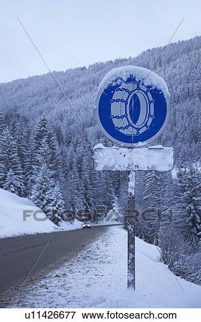 Stock Photo - Sign at side of road in the winter. Fotosearch