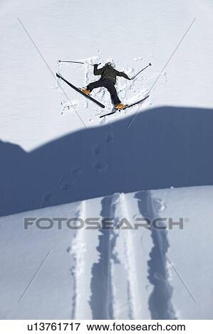Skier head down in snow View Large Photo Image Stock Photo - Skier head down in snow. Fotosearch