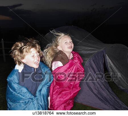 Sleeping bag races at dusk View Large Photo Image Picture - Sleeping bag races at dusk. Fotosearch