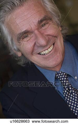 Smiling business man View Large Photo Image Stock Image - Smiling business man. Fotosearch