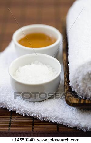 Stock Image - Still-life honey and salt. Fotosearch