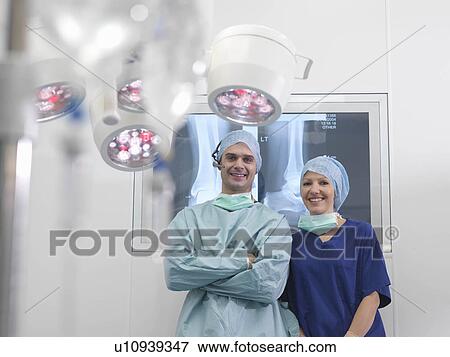 Surgeon and nurse in operating theatre View Large Photo Image Stock Photo - Surgeon and nurse in operating theatre. Fotosearch