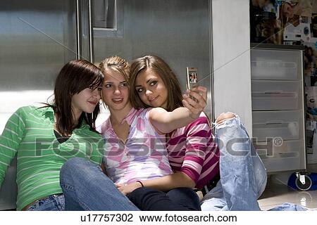 Teen girls take self portrait View Large Photo Image Stock Image - Teen girls take self portrait. Fotosearch