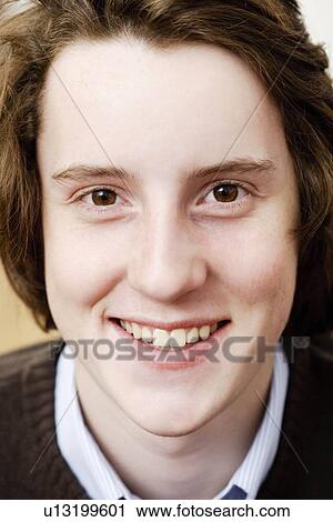 Teenage boy looking to camera View Large Photo Image Stock Image - Teenage boy looking to camera. Fotosearch