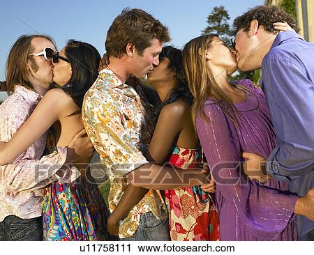 Three couples kissing at sunset View Large Photo Image Stock Image - Three couples kissing at sunset. Fotosearch