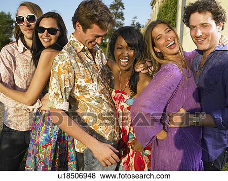Three couples smiling at sunset View Large Photo Image Stock Photo - Three couples smiling at sunset. Fotosearch