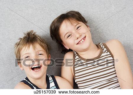 Two brothers having fun View Large Photo Image Stock Photo - Two brothers having fun. Fotosearch