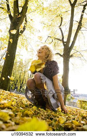 Stock Image - Woman enjoying leisure time. Fotosearch