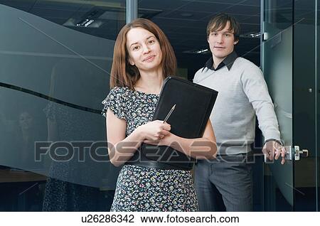 Woman entering boardroom View Large Photo Image Stock Image - Woman entering boardroom. Fotosearch