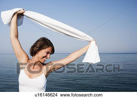 Picture - Woman having fun. Fotosearch