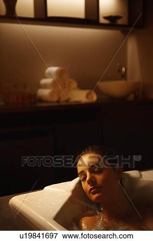 Woman in bubble bath View Large Photo Image Stock Photo - Woman in bubble bath. Fotosearch