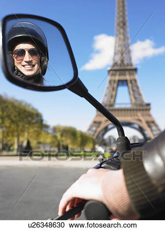 Woman on moped in Paris View Large Photo Image Stock Image - Woman on moped in Paris. Fotosearch