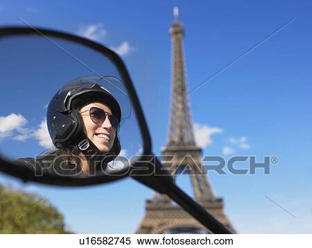 Woman on moped in Paris View Large Photo Image Stock Photography - Woman on moped in Paris. Fotosearch