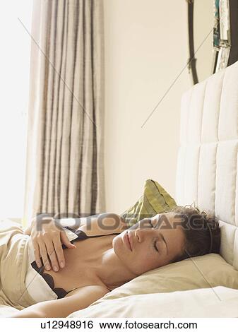 Stock Photograph - Woman sleeping. Fotosearch