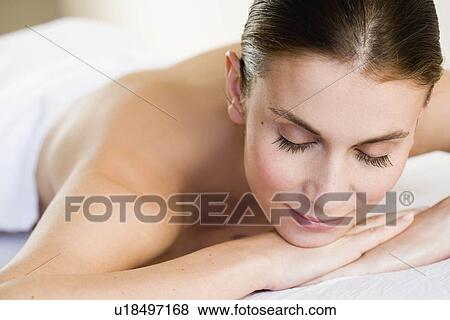 Woman waiting being massaged View Large Photo Image Stock Photo - Woman waiting being massaged. Fotosearch