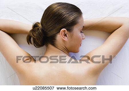 Stock Photo - Woman waiting being massaged. Fotosearch