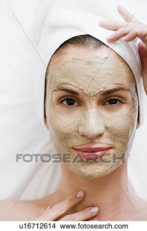 Picture - Woman with face mask. Fotosearch