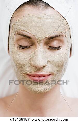 Woman with face mask View Large Photo Image Stock Photo - Woman with face mask. Fotosearch