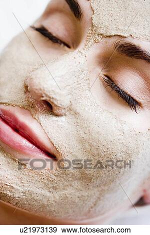 Woman with face mask View Large Photo Image Stock Photo - Woman with face mask. Fotosearch