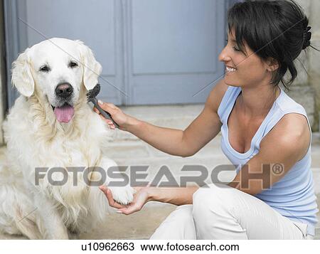Woman with her dog View Large Photo Image Stock Image - Woman with her dog. Fotosearch