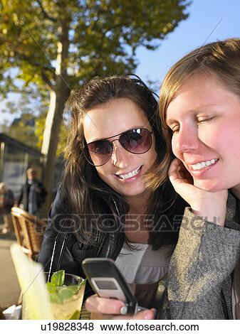 Women on terrace of café View Large Photo Image Stock Photo - Women on terrace of café. Fotosearch