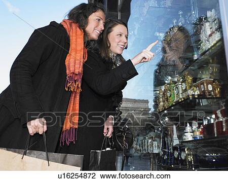 Women window shopping View Large Photo Image Stock Image - Women window shopping. Fotosearch