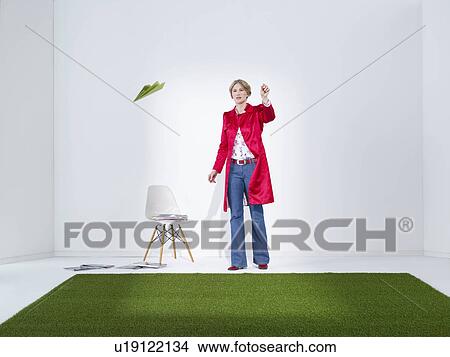 Women with paper plane in green office View Large Photo Image Picture - Women with paper plane in green office. Fotosearch