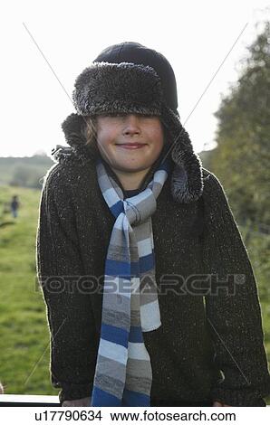 Young boy in countryside View Large Photo Image Picture - Young boy in countryside. Fotosearch