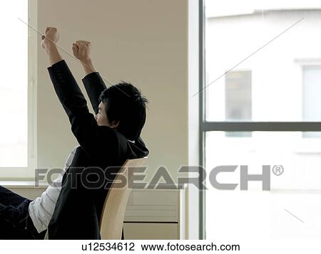 Young business man cheering View Large Photo Image Stock Image - Young business man cheering. Fotosearch