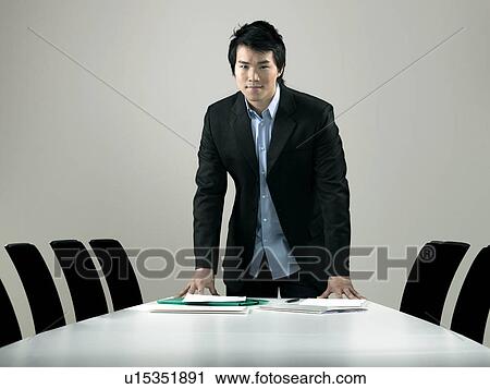 Stock Image - "Young business man, portrait". Fotosearch