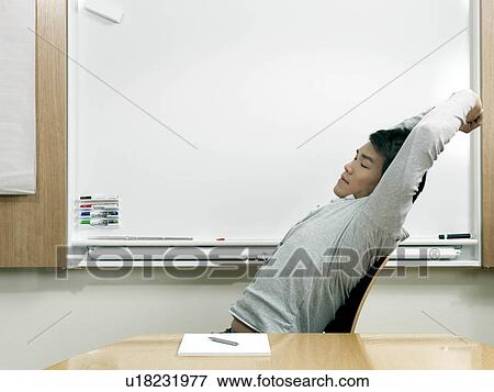 Stock Photo - Young business man relaxing. Fotosearch