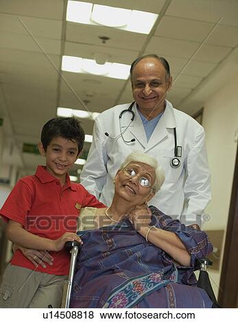 Stock Photo - A doctor and a family. Fotosearch