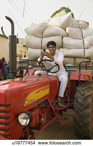 A farmer with his commodities View Large Photo Image Picture - A farmer with his commodities. Fotosearch
