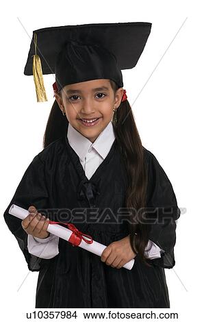 A girl dressed in a convocation attire View Large Photo Image Picture - A girl dressed in a convocation attire. Fotosearch