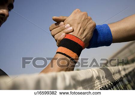 A handshake View Large Photo Image Stock Image - A handshake. Fotosearch