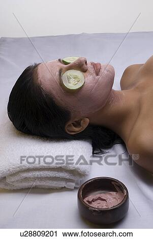 A woman lying down in a spa View Large Photo Image Stock Image - A woman lying down in a spa. Fotosearch